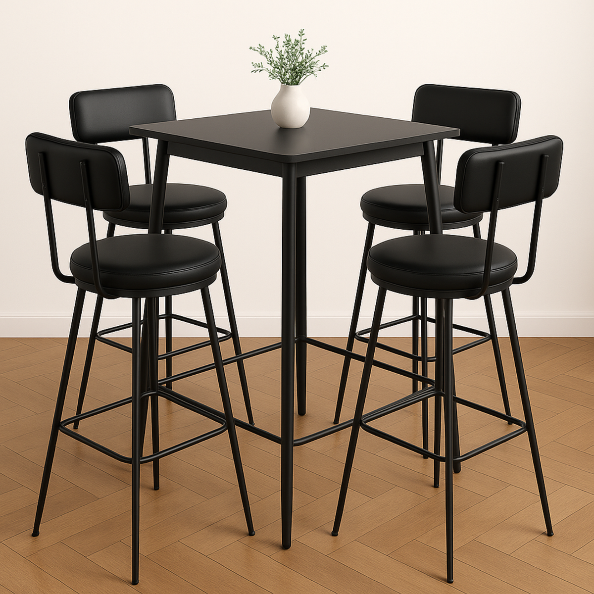 Chaises de bar noires en métal et simili cuir autour d’une table haute